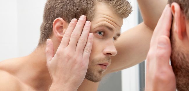 Man checking for hair loss